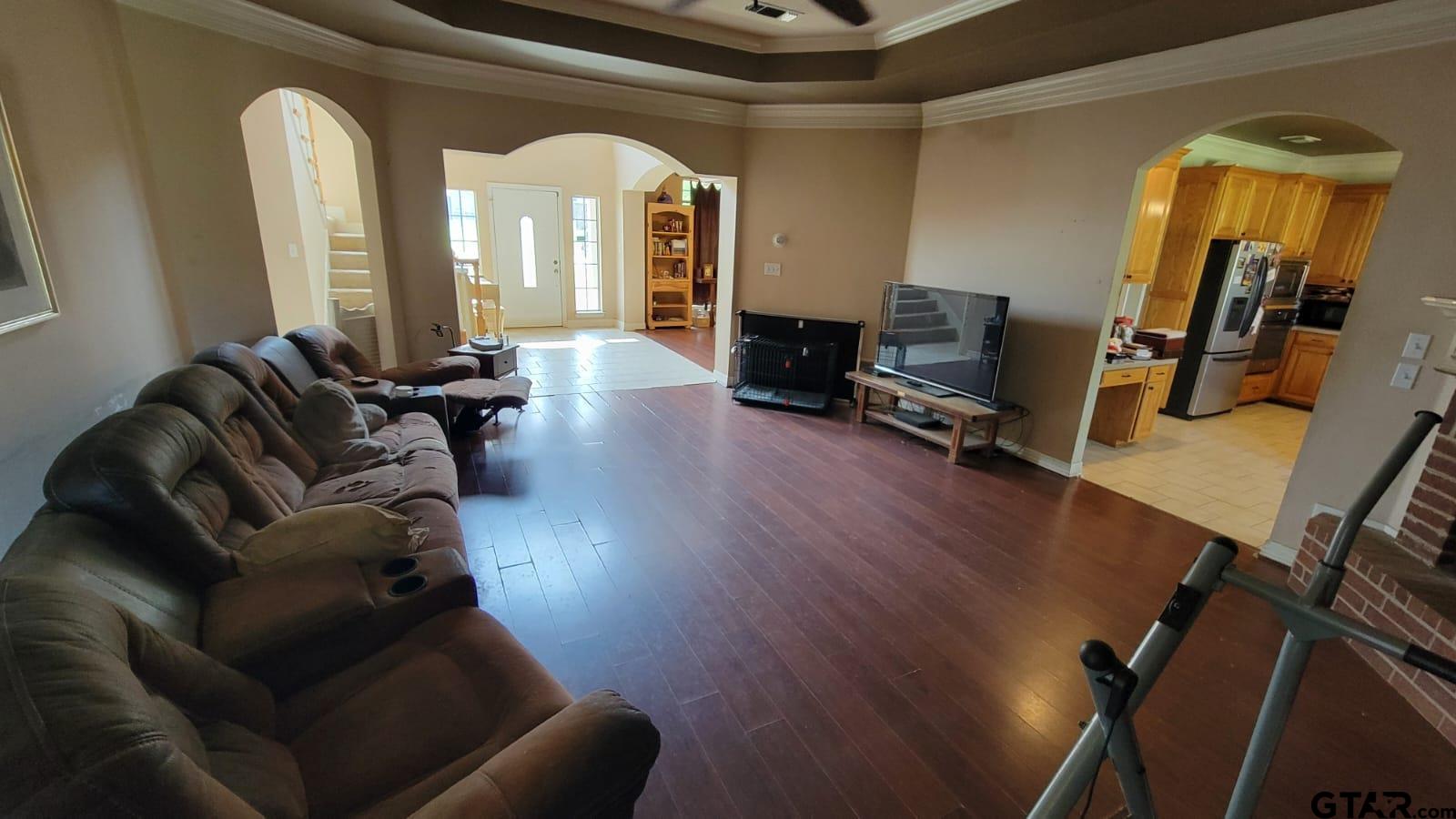 100 Thames Drive Bullard, TX 75757 - Photo 5 of 32 a living room with furniture and a wooden floor