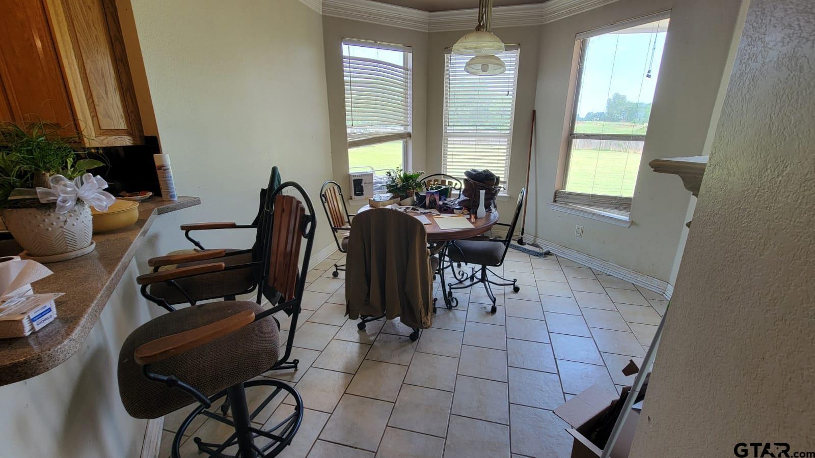 100 Thames Drive Bullard, TX 75757 - Photo 9 of 32 a view of a workspace with furniture and a window