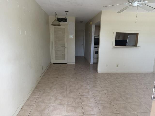 660 Glouchester Street, Unit 206 Boca Raton, FL 33487 - Photo 6 of 13 a view of a livingroom with an empty space