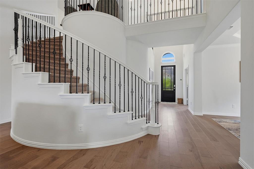 809 Violet Way Celina, TX 75009 - Photo 5 of 38 Entry with circular staircase