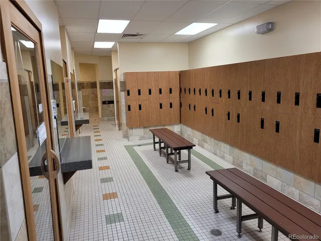 a view of a house with backyard porch and sitting area