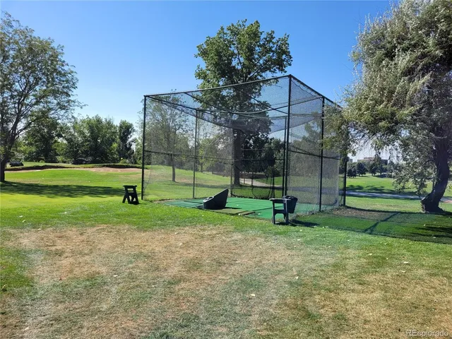 a view of a golf course with a lake