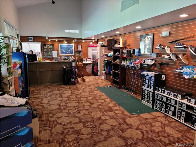 a view of a house with backyard and porch
