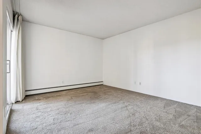 an empty room with an entryway