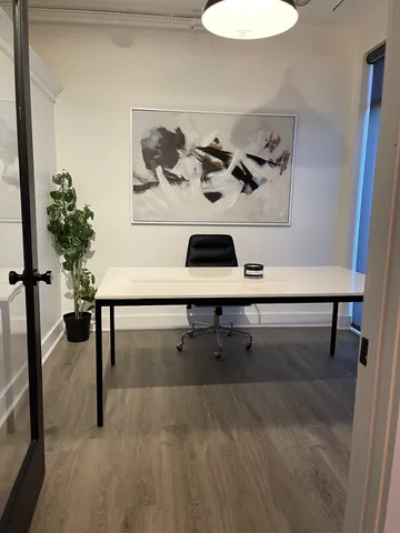 a view of workspace with furniture