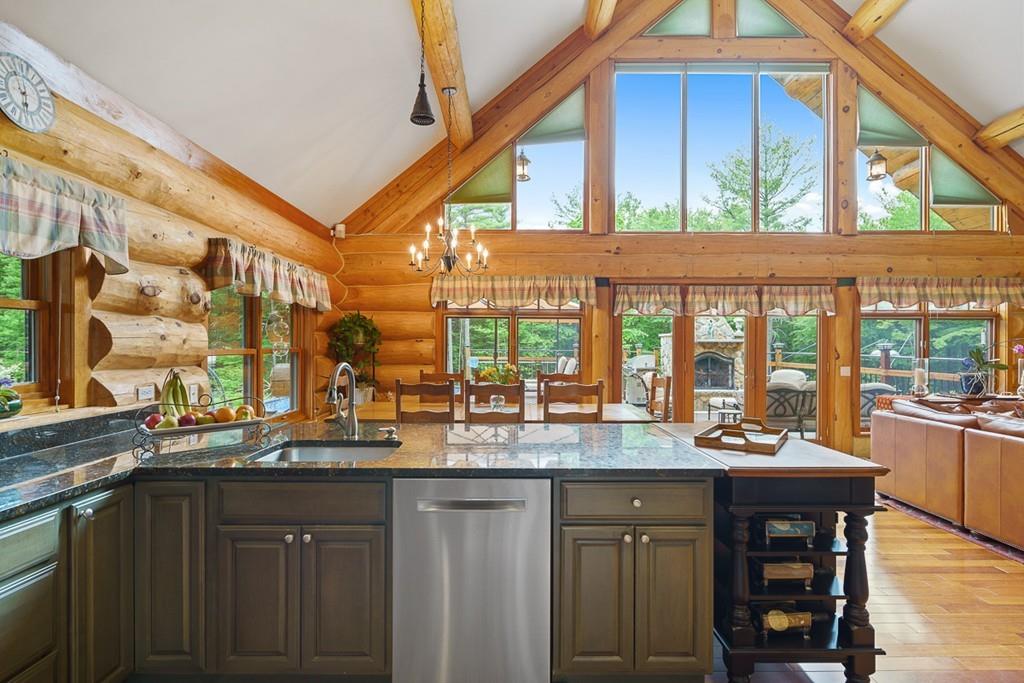 49 Beaman Road Princeton, MA 01541 - Photo 11 of 42 a kitchen with a sink and large windows