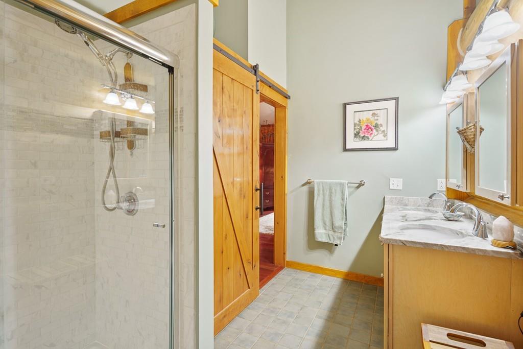 49 Beaman Road Princeton, MA 01541 - Photo 18 of 42 a bathroom with a granite countertop shower and a sink