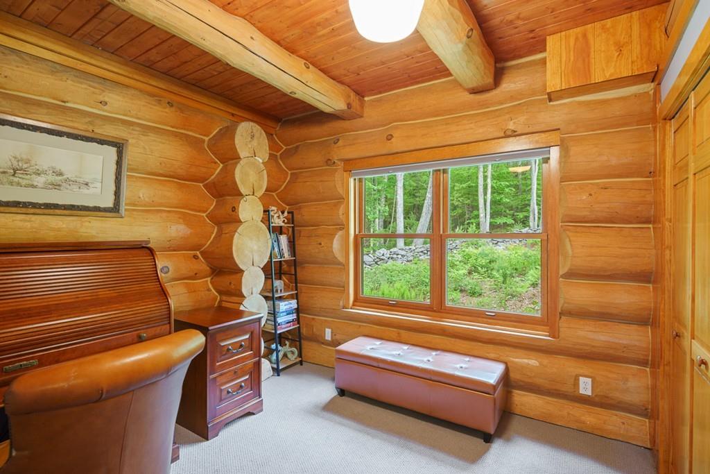 49 Beaman Road Princeton, MA 01541 - Photo 20 of 42 a living room with a couch and a window