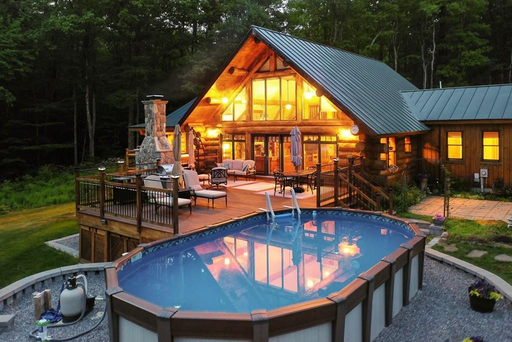 49 Beaman Road Princeton, MA 01541 - Photo 36 of 42 a view of swimming pool with outdoor seating and plants