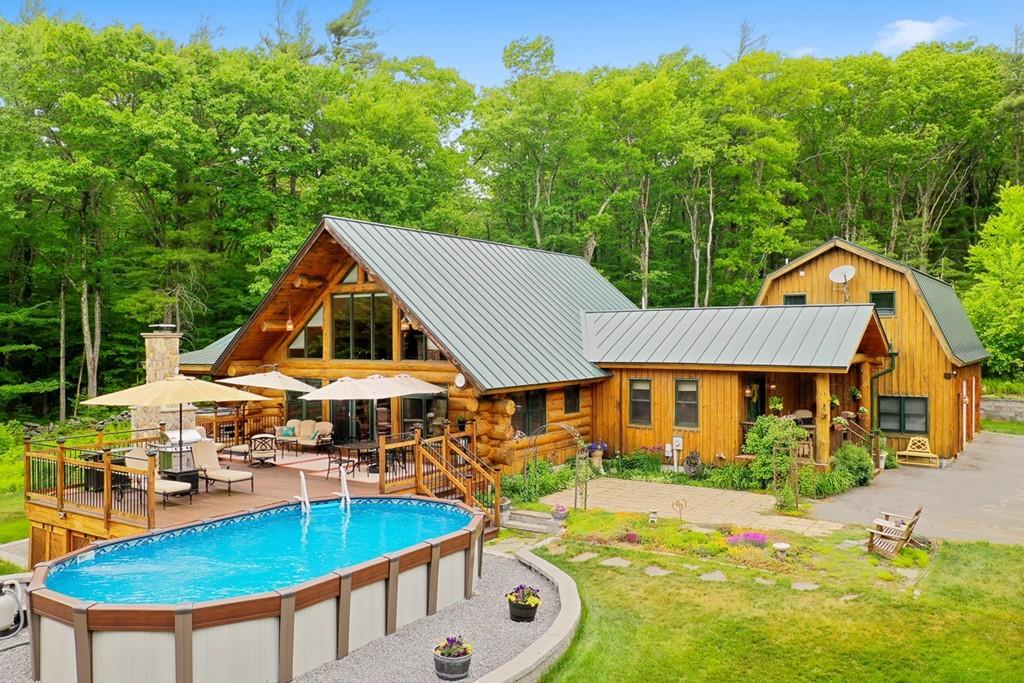 49 Beaman Road Princeton, MA 01541 - Photo 39 of 42 an aerial view of a house with swimming pool garden and patio