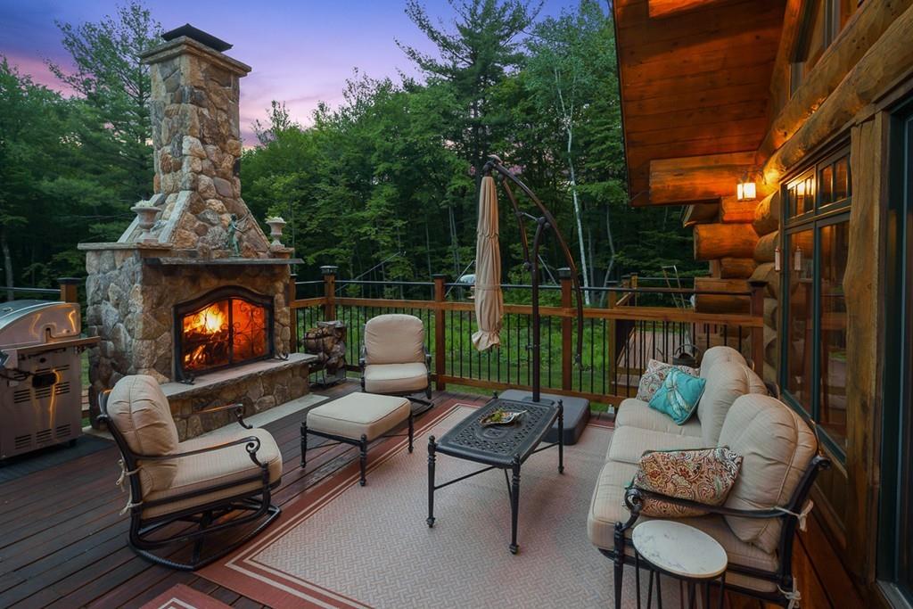 49 Beaman Road Princeton, MA 01541 - Photo 4 of 42 a outdoor living space with furniture and a fireplace