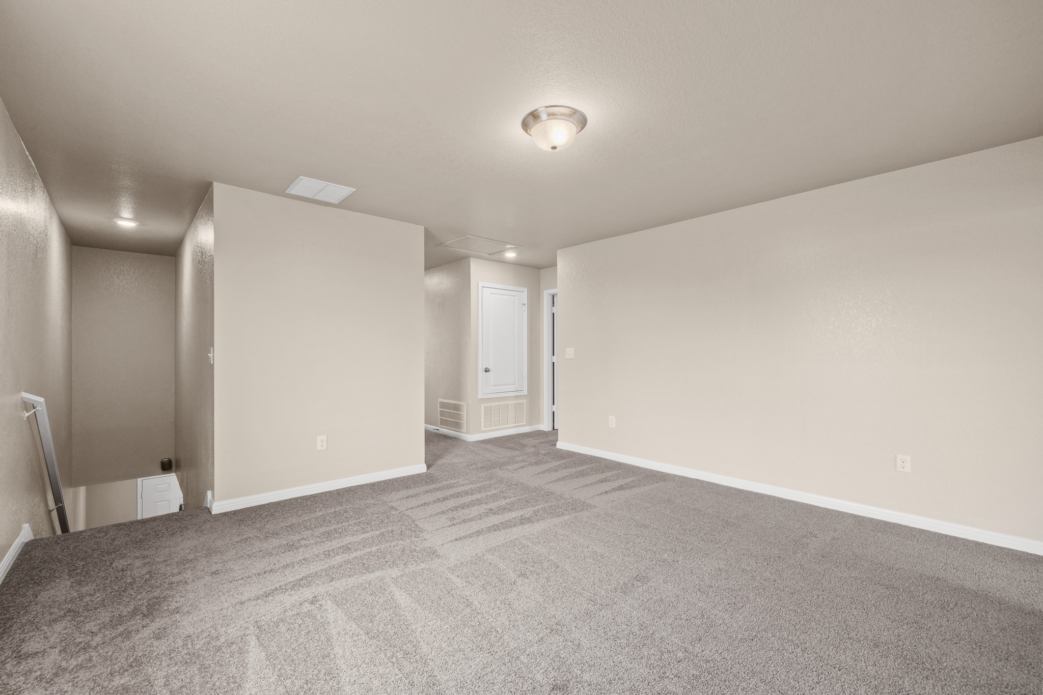 241 Night Riders Way Jarrell, TX 76537 - Photo 16 of 39 Carpeted spare room with baseboards