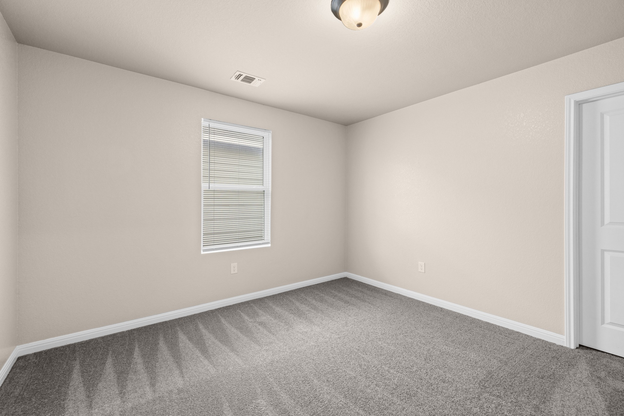 241 Night Riders Way Jarrell, TX 76537 - Photo 21 of 39 Carpeted empty room featuring baseboards