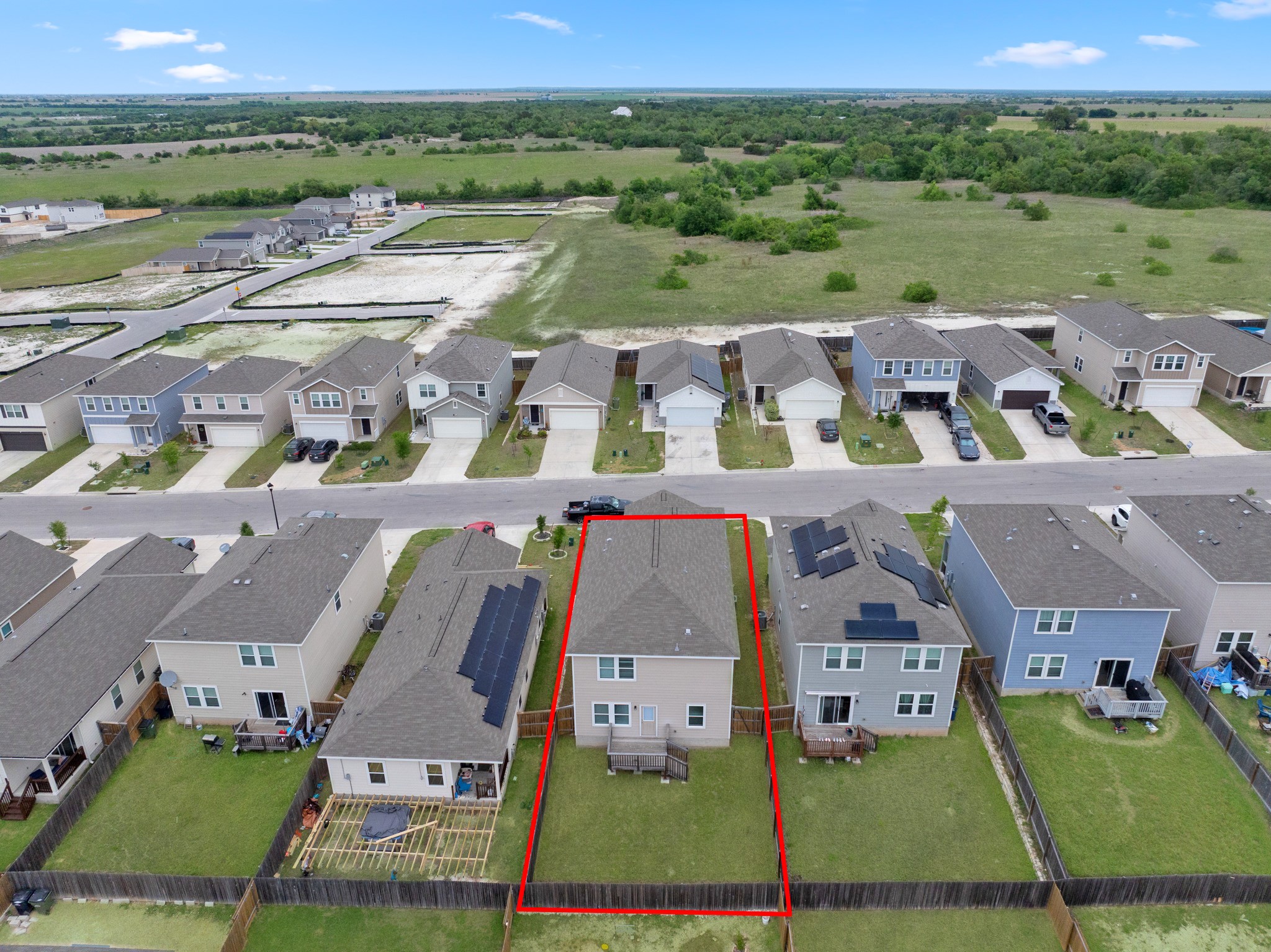 241 Night Riders Way Jarrell, TX 76537 - Photo 33 of 39 Aerial view of residential area with property parcel outlined