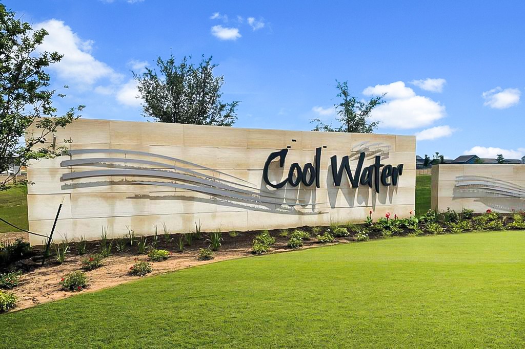 241 Night Riders Way Jarrell, TX 76537 - Photo 34 of 39 Community / neighborhood sign featuring a lawn