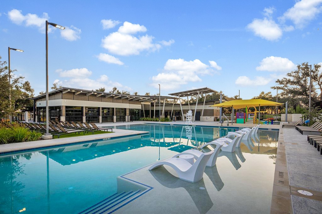 241 Night Riders Way Jarrell, TX 76537 - Photo 37 of 39 Community pool featuring a patio and a pergola