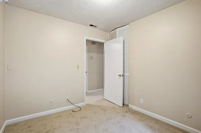 an empty room with an entryway