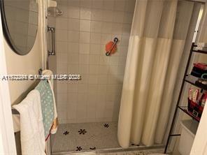 3571 Inverrary Drive, Unit 408 Lauderhill, FL 33319 - Photo 4 of 13 a bathroom with a shower