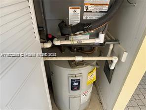 3571 Inverrary Drive, Unit 408 Lauderhill, FL 33319 - Photo 8 of 13 a utility room with dryer and washer