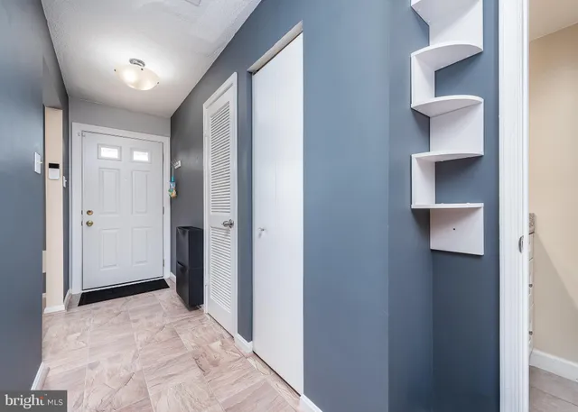 a view of a hallway with an empty space