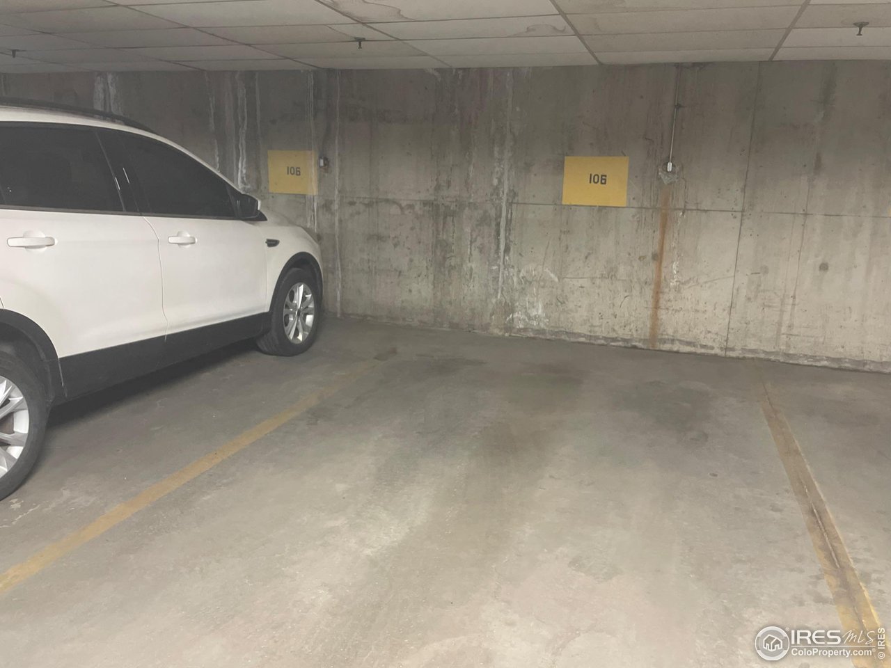 935 Broadway, Unit 106 Boulder, CO 80302 - Photo 20 of 34 a car parked in garage