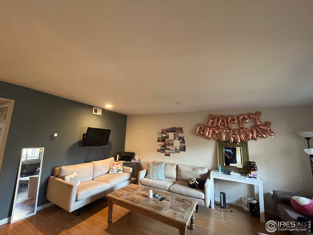 935 Broadway, Unit 106 Boulder, CO 80302 - Photo 32 of 34 a living room with furniture