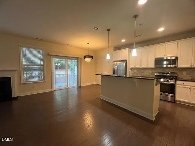 a view of a hallway with staircase