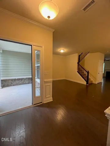 a view of a hallway with staircase