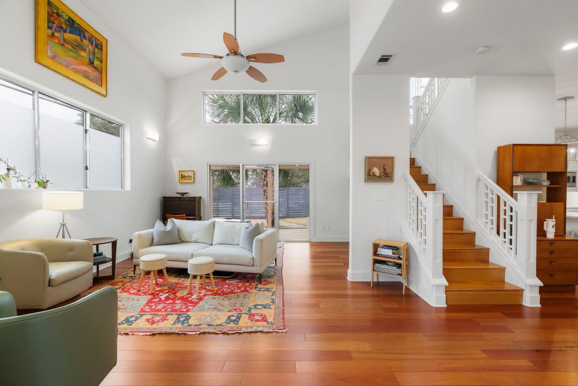 2700 Cherry Lane, Unit A Austin, TX 78703 - Photo 1 of 1 a living room with furniture wooden floor and a chandelier