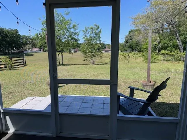 a view of an outdoor space and swimming pool