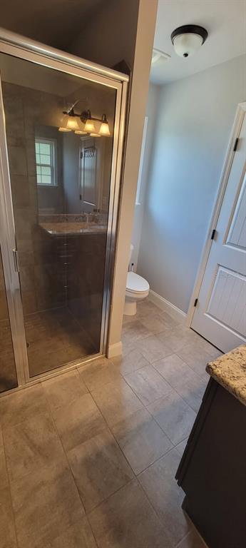 2032 Southwest 252nd Street Newberry, FL 32669 - Photo 10 of 23 a view of a hallway with wooden floor and a cabinet