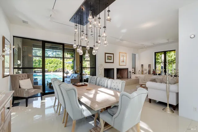 a view of a dining room with furniture window and outside view
