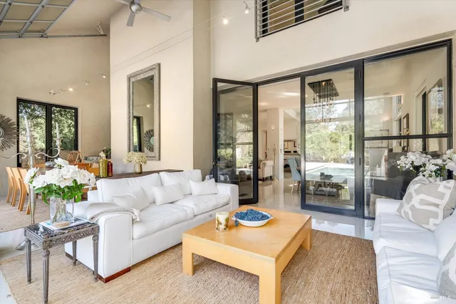 a spacious bathroom with sink shower and bathtub