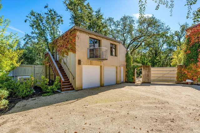 a wooden bench sitting in the middle of a park