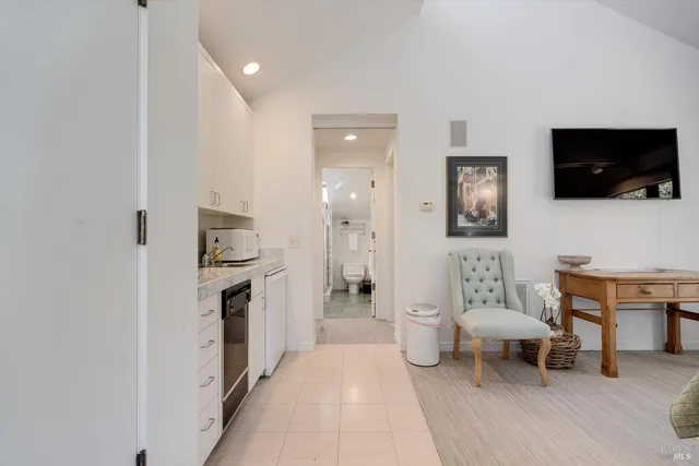 a view of a backyard with sitting area