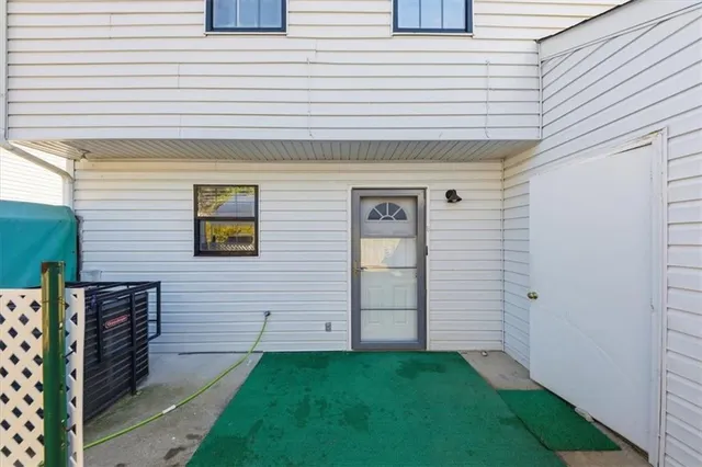 a view of a patio in front view of a house