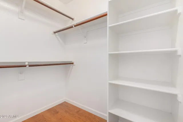 a view of a bathroom with a glass door shower