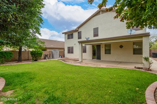 a view of backyard with green space