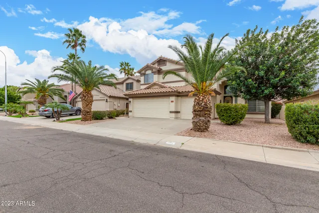 a view of a house with a street