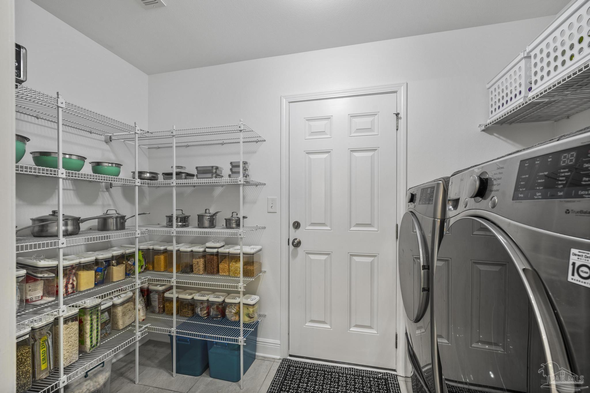 5981 Dunridge Drive Pace, FL 32571 - Photo 16 of 39 a view of storage and utility room