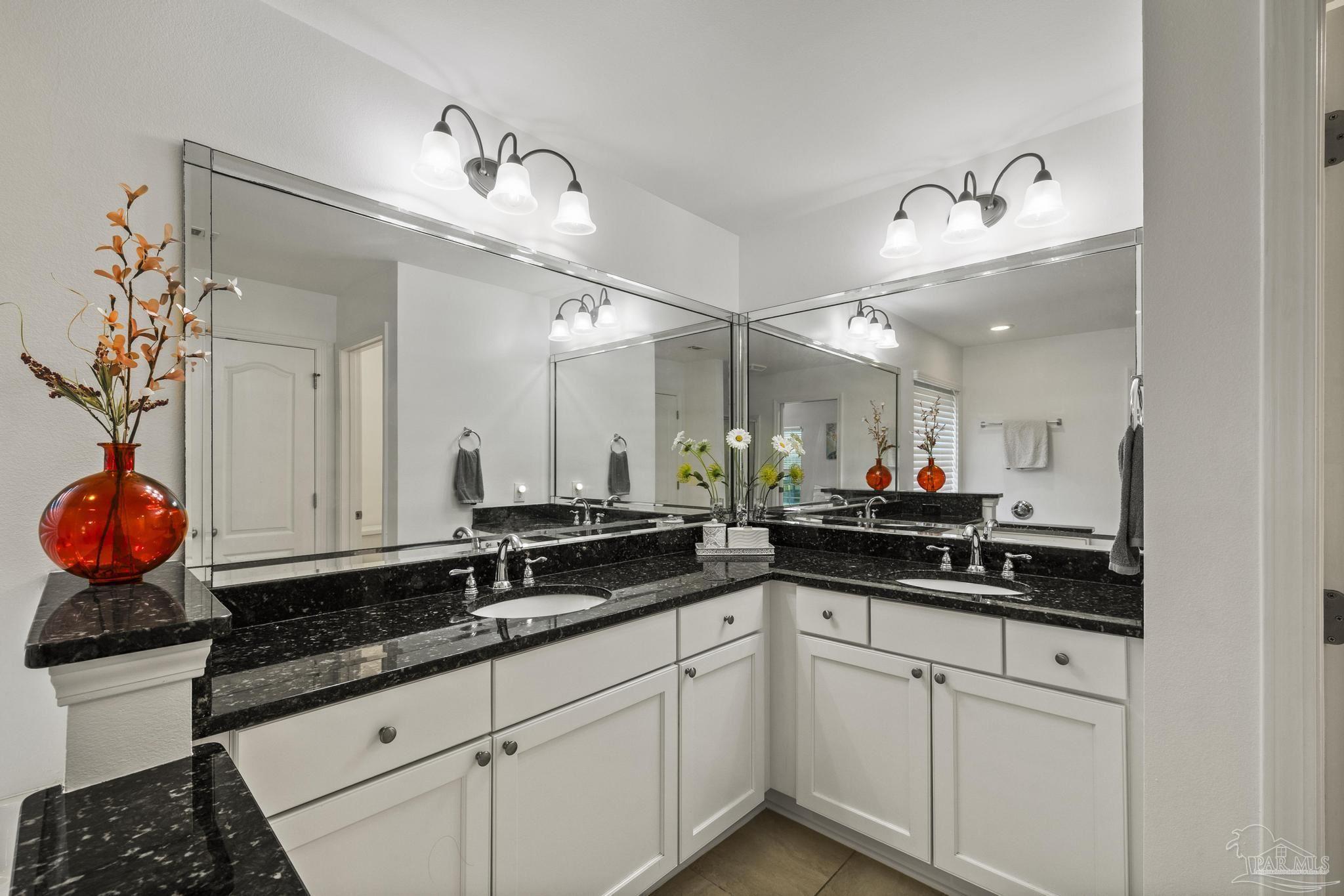 5981 Dunridge Drive Pace, FL 32571 - Photo 21 of 39 a kitchen with a sink and cabinets