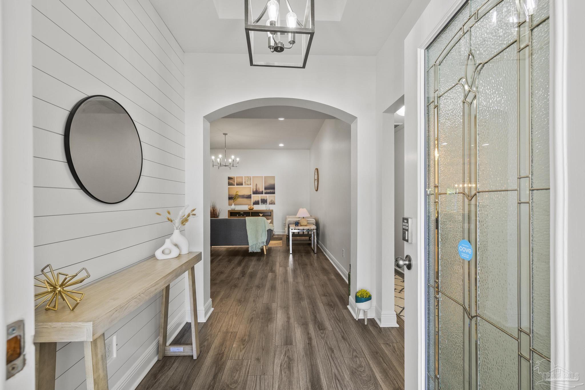 5981 Dunridge Drive Pace, FL 32571 - Photo 7 of 39 workspace with wooden floor mirror and furniture