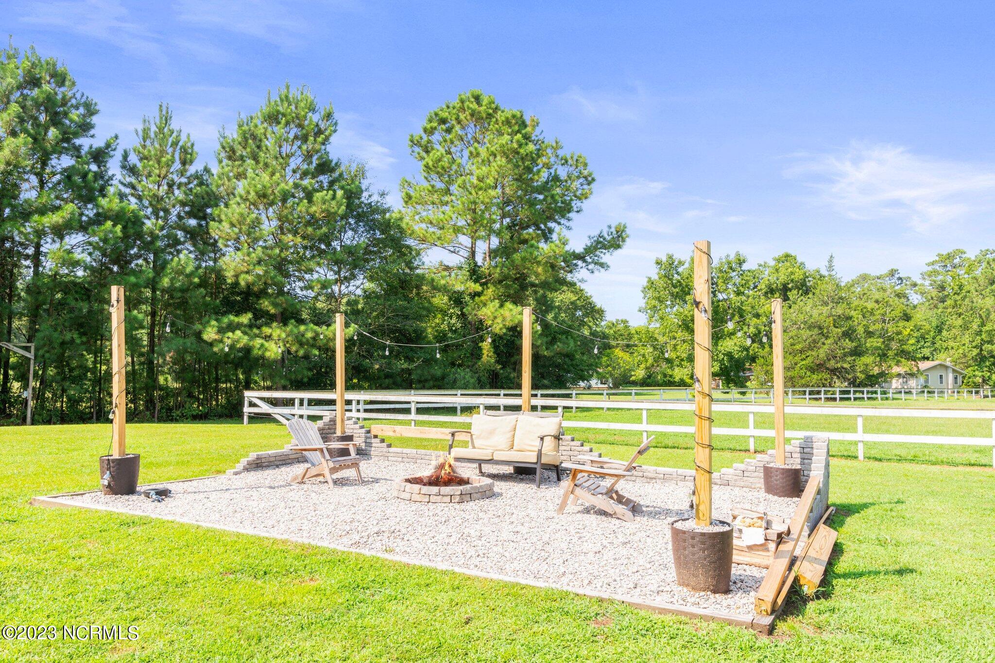 893 Calabash Road Northwest Calabash, NC 28467 - Photo 28 of 34 Fire Pit Area