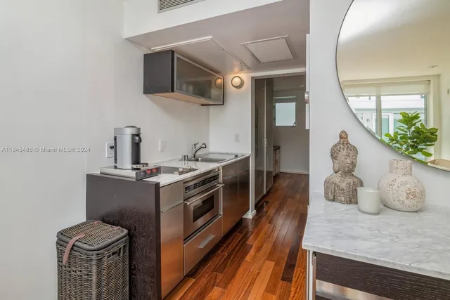 a view of living room with furniture and flat screen tv