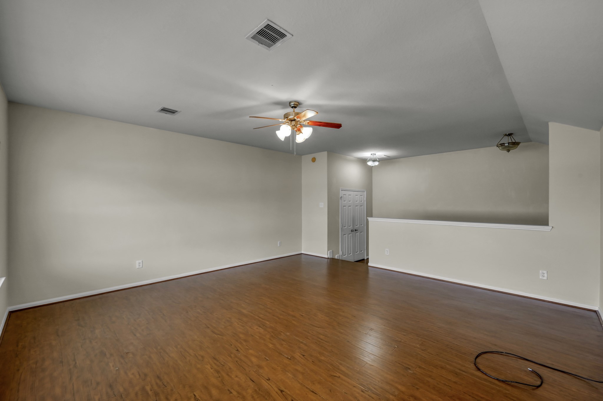 631 Timberstand Lane Spring, TX 77373 - Photo 34 of 38 Another view of the upstairs game room highlights the generous size, open layout, and additional storage closet, making this a great multi-purpose space.