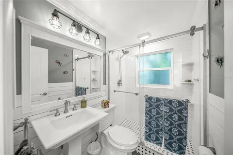 a bed room with a bed and a couch