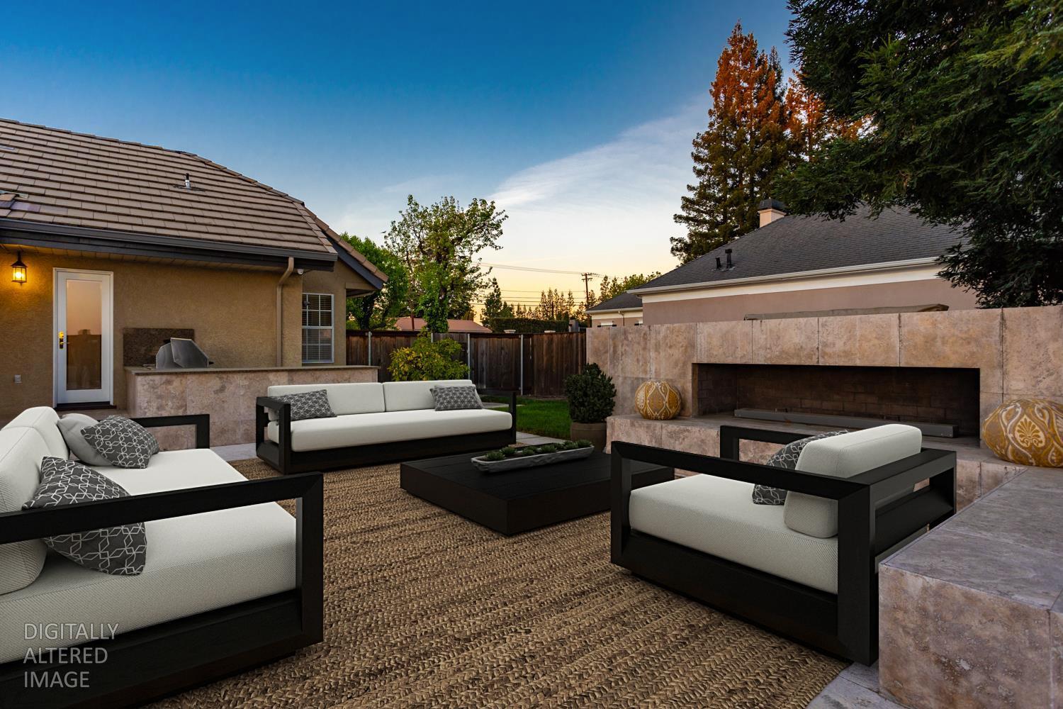 808 Country Club Drive Modesto, CA 95356 - Photo 11 of 60 a view of a patio with couches and a fireplace