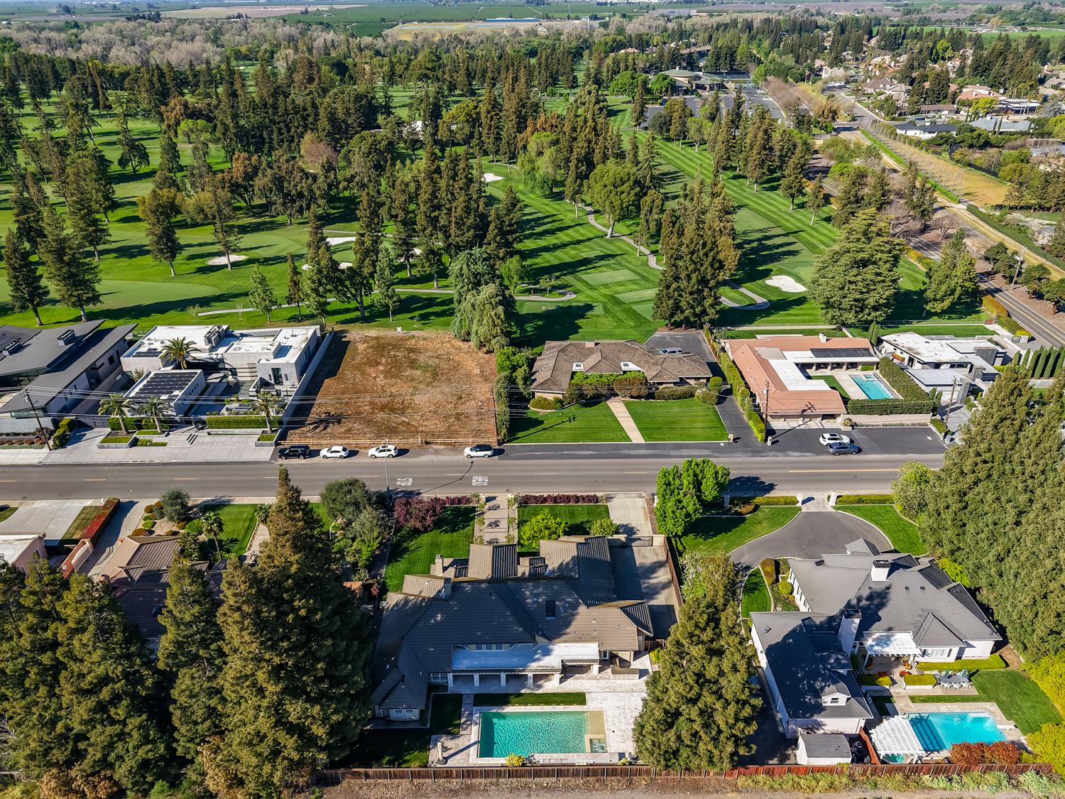 808 Country Club Drive Modesto, CA 95356 - Photo 15 of 60 an aerial view of residential houses with outdoor space