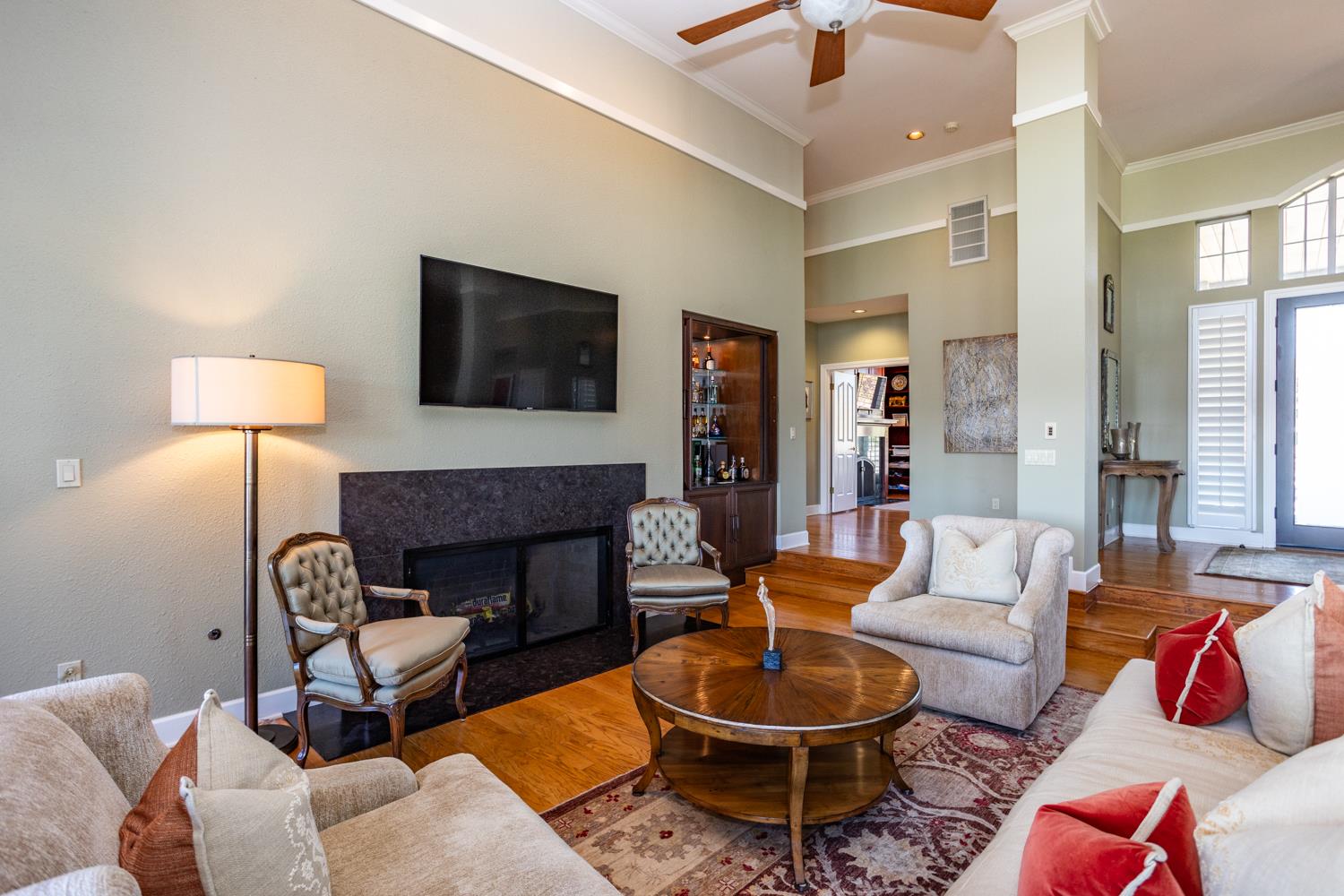 808 Country Club Drive Modesto, CA 95356 - Photo 21 of 60 a living room with furniture and a fireplace