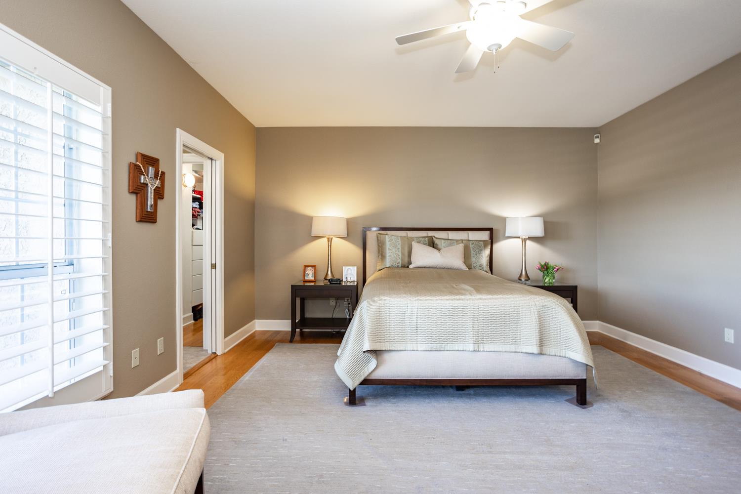 808 Country Club Drive Modesto, CA 95356 - Photo 35 of 60 a bedroom with a bed and wooden floor